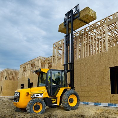 Forklift unloading machinery and industrial equipment in Watford